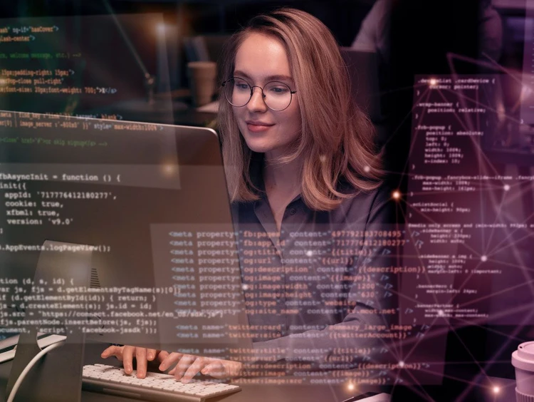 Girl works on pc using programming languages