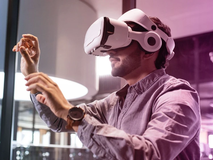 Man experiences augmented reality using a vr visor.