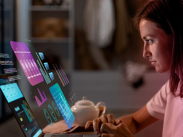 Girl observes a virtual whiteboard with graphs and performs analysis.