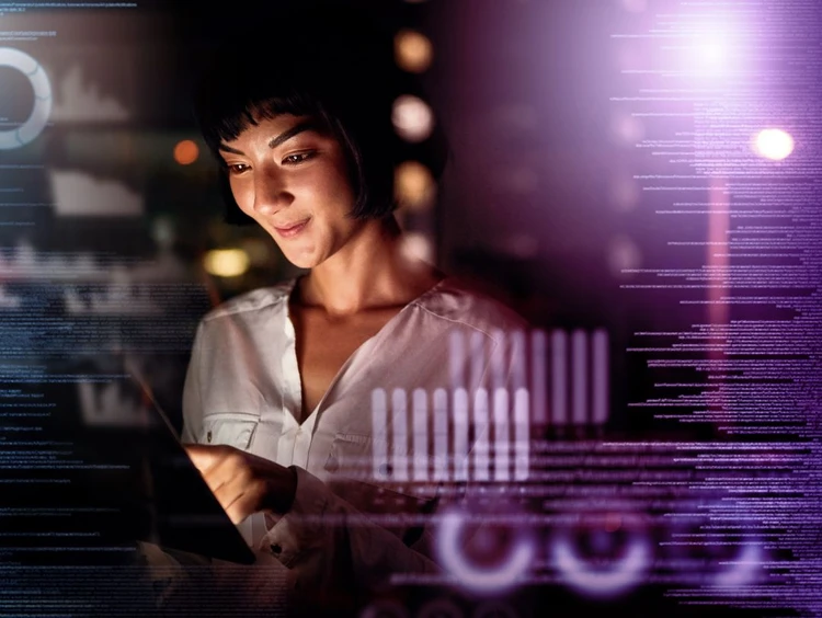 Professional works on tablets and analyses graphics.